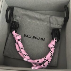 Balenciaga show string earrings